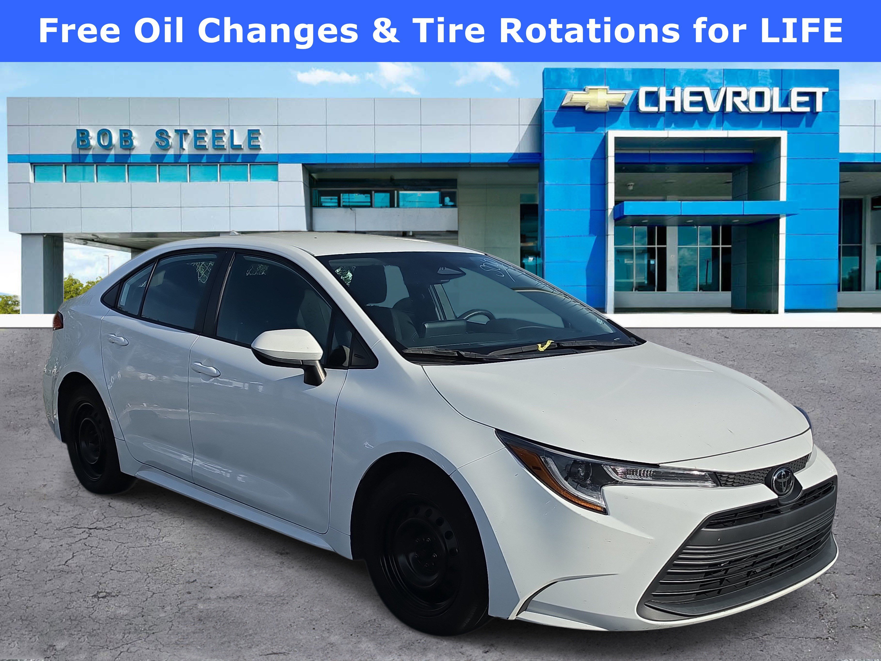 Used 2023 White Toyota LE image 1