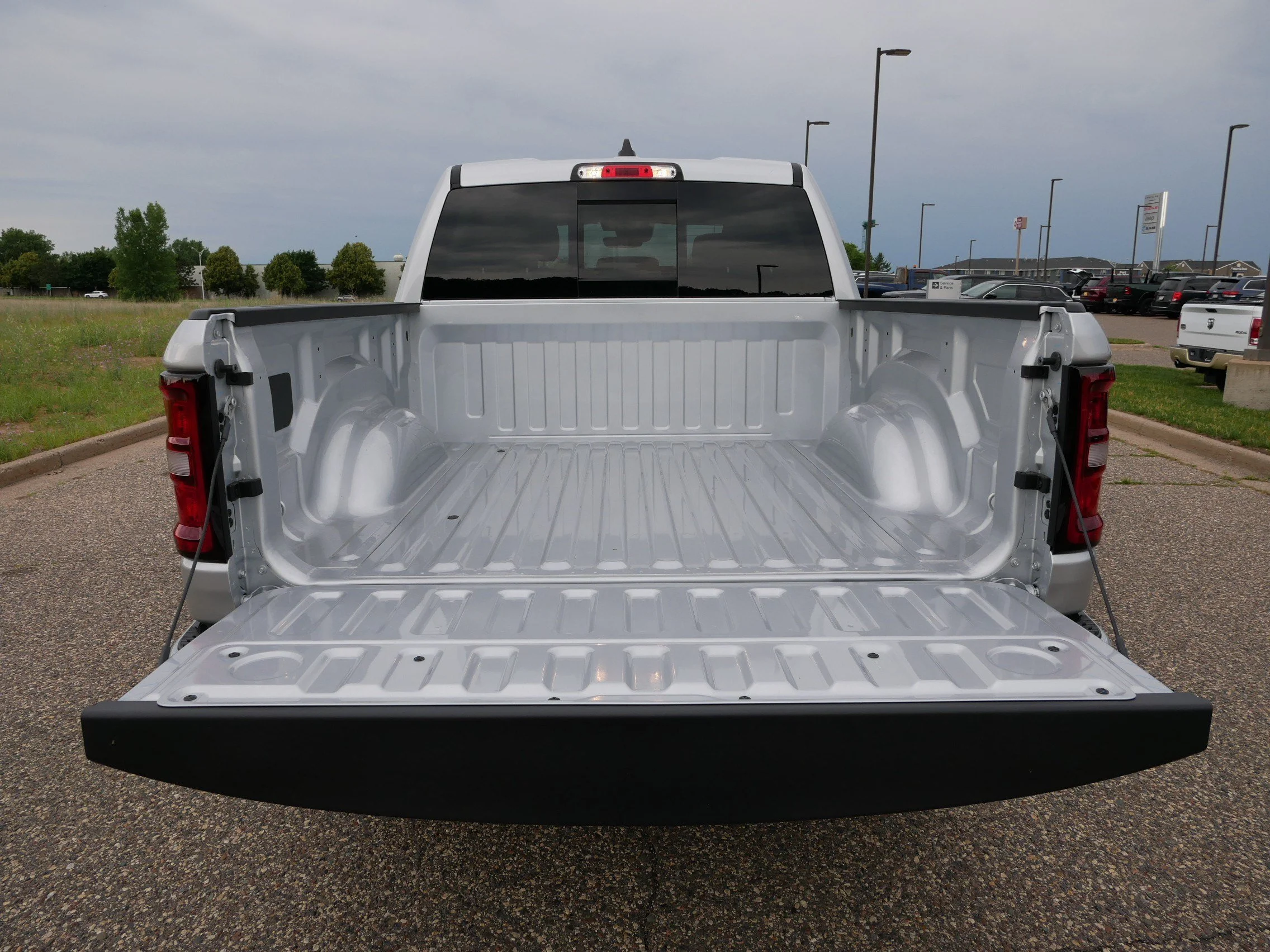 New 2026 Silver Zynith Exterior Paint RAM Laramie image 6