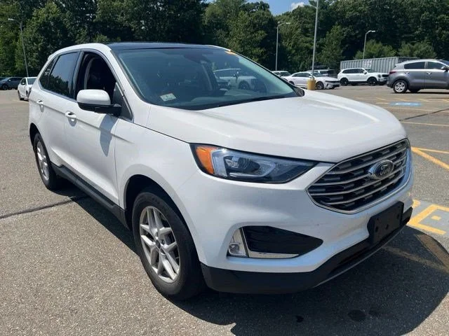 Used 2021 White Metallic Ford SEL image 1