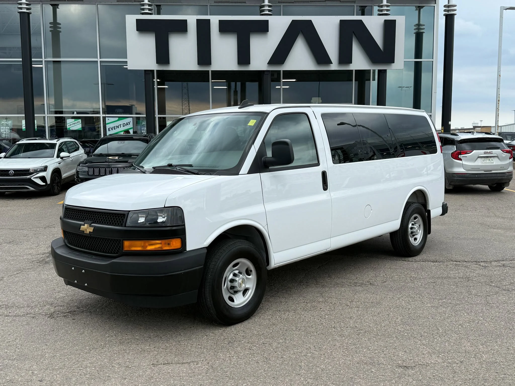 Certified Used 2025 Summit White Chevrolet LS Passenger*12 Pass | 6.6L V8 | Remote Start | Rear Climate | Htd Mirrors | Rubber Lined Flooring image 2