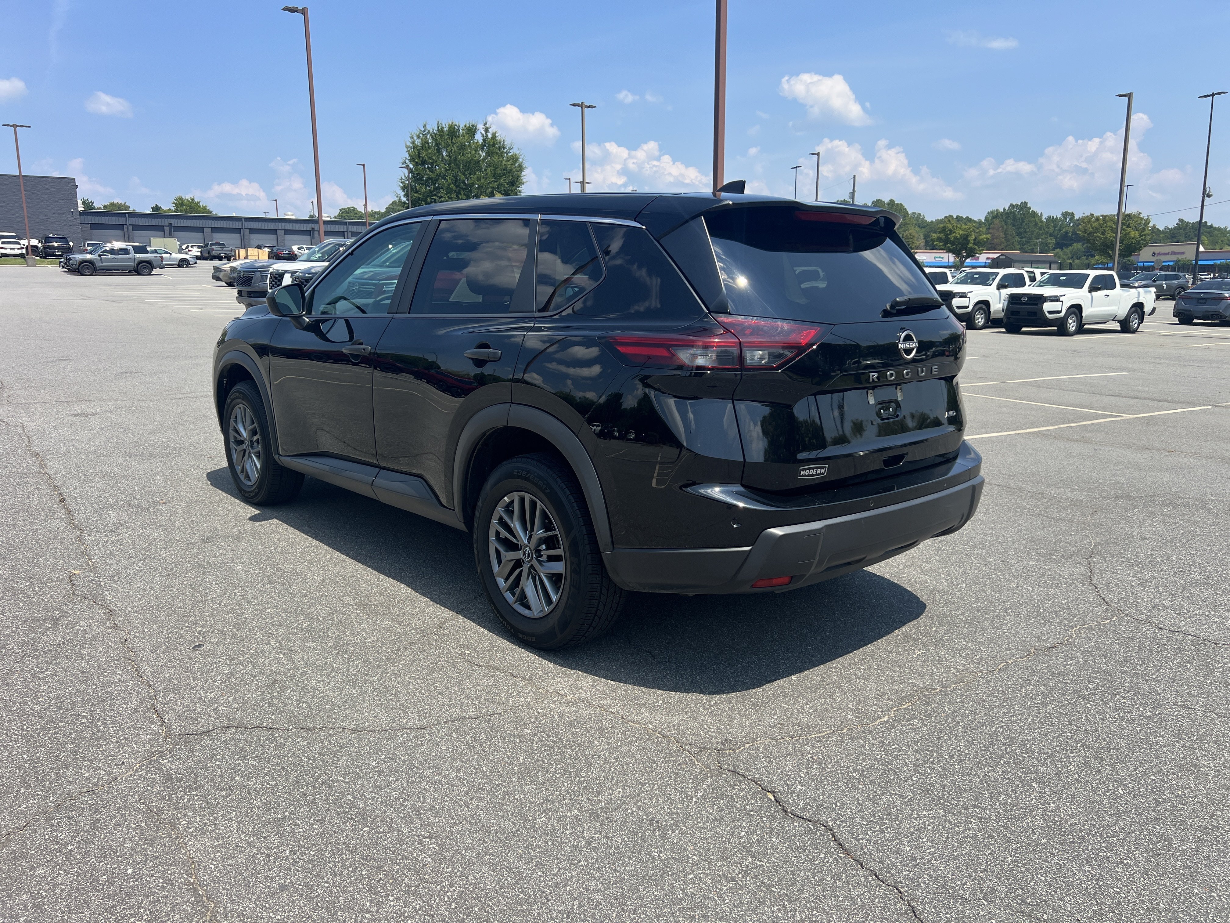 Certified Used 2024 Super Black Nissan S image 7