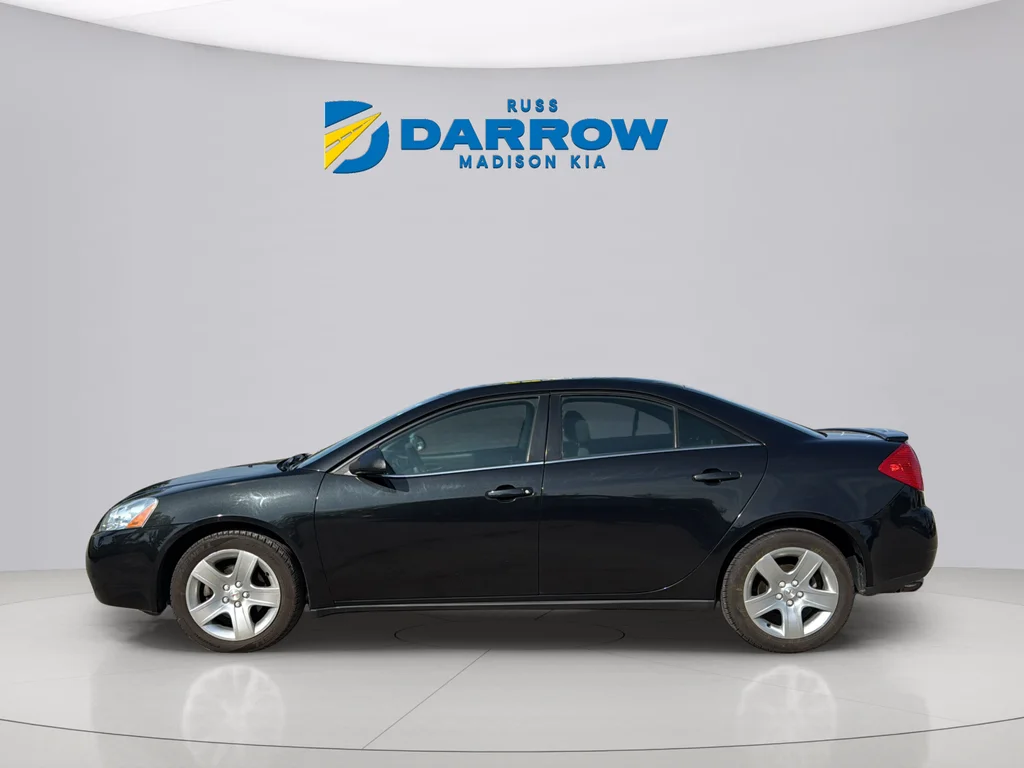 Used 2009 Carbon Black Metallic Pontiac Base image 2