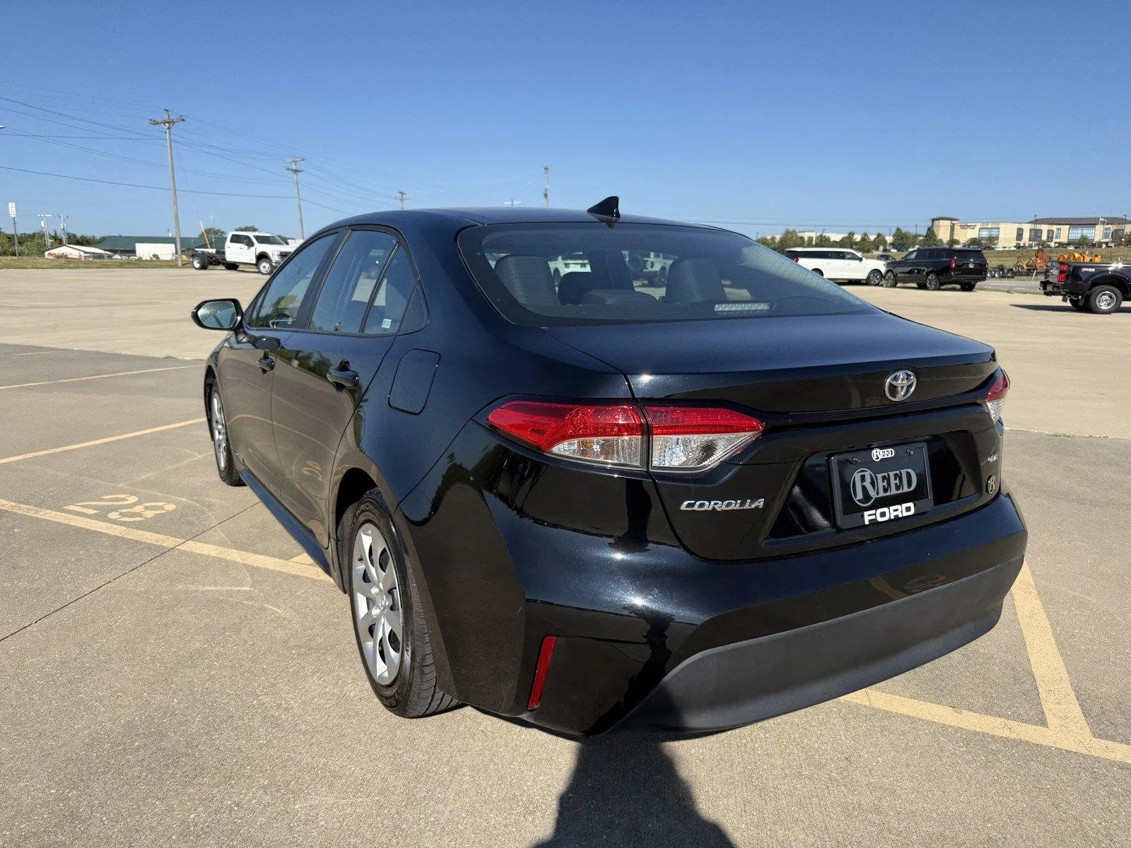 Certified Used 2025 Midnight Black Metallic Toyota LE image 7
