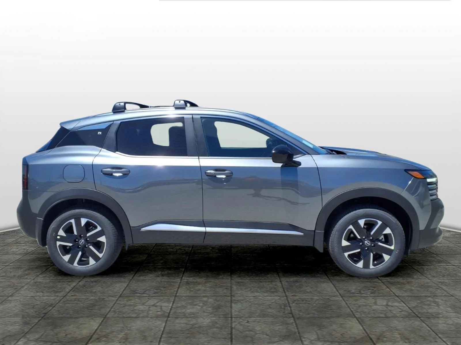 New 2026 Gun Metallic Nissan SV image 2