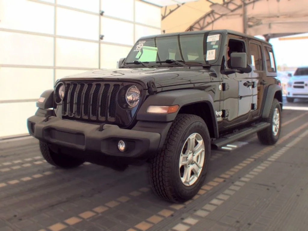 Used 2019 Black Jeep Unlimited Sport S image 1