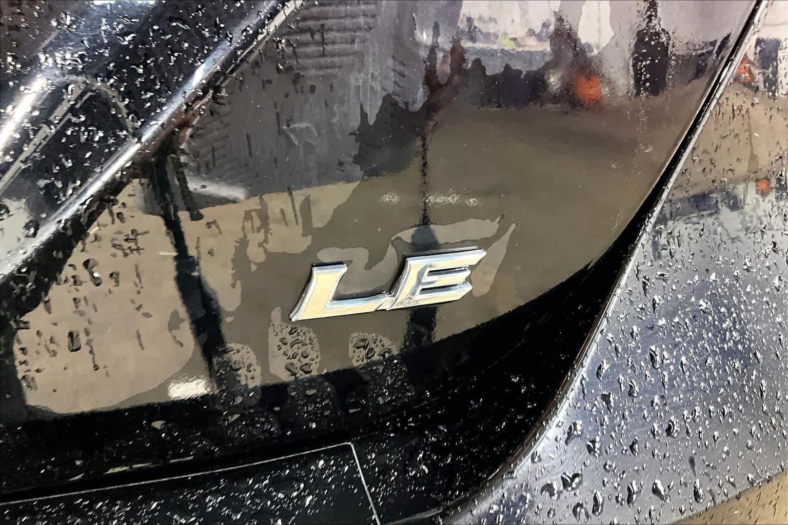 Used 2024 Midnight Black Metallic Toyota LE image 10