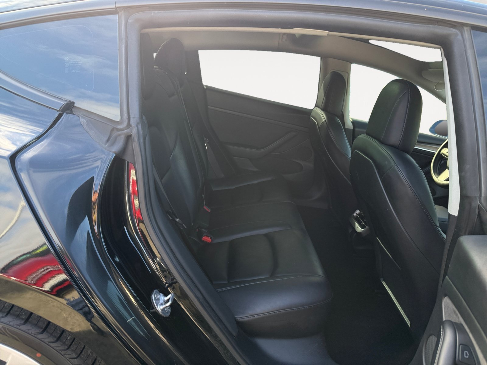 Used 2022 Solid Black Tesla Base image 18