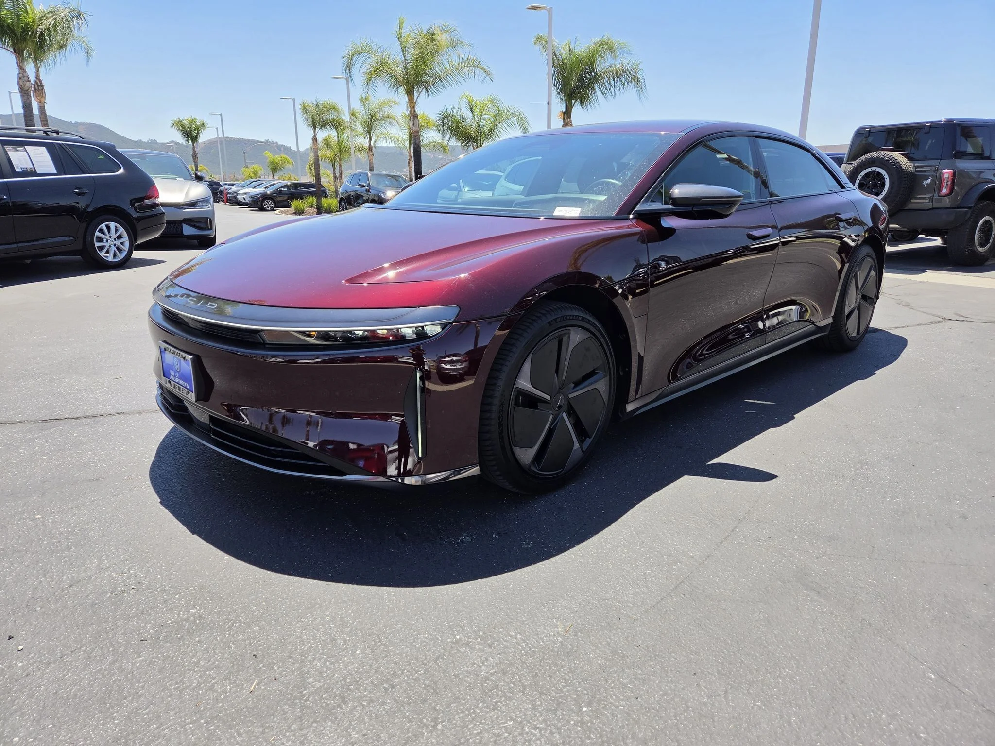 Used 2024 Zenith Red Metallic Lucid Touring image 3