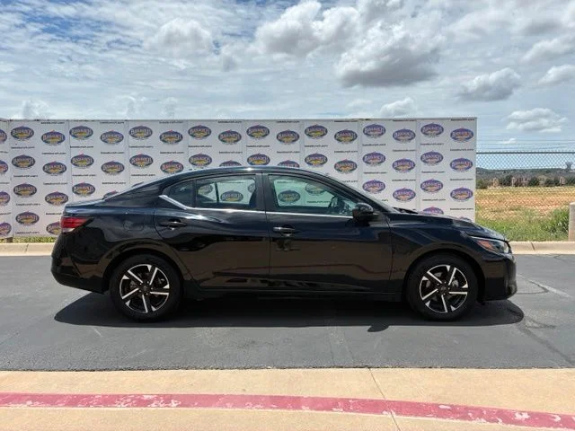 Used 2024 Super Black Nissan SV image 1