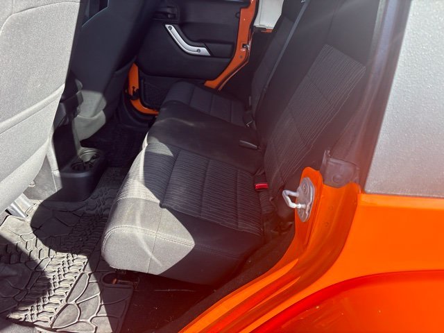 Used 2012 Orange Jeep Unlimited Sahara image 6