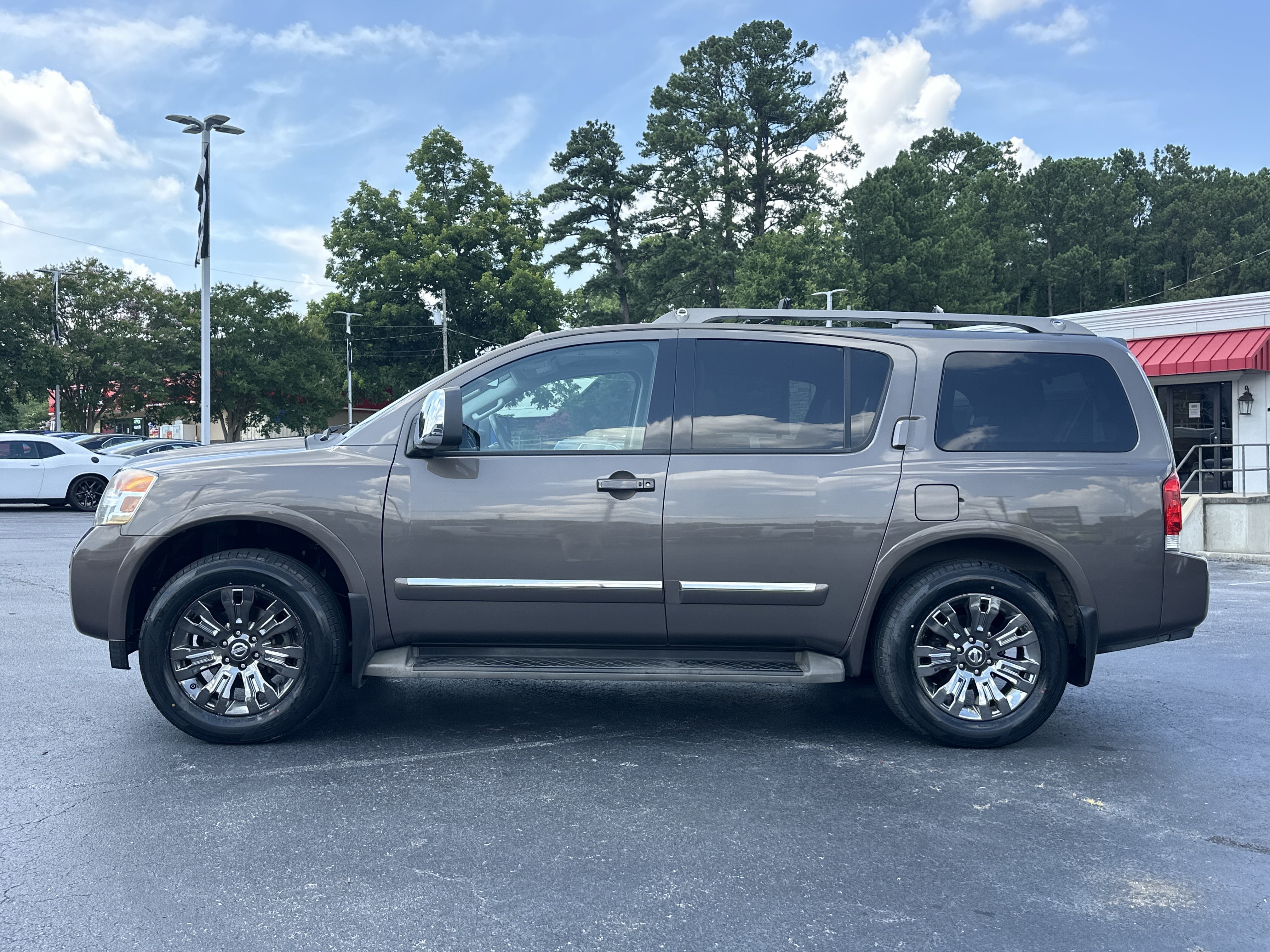 Used 2015 Java Metallic Nissan Platinum image 4