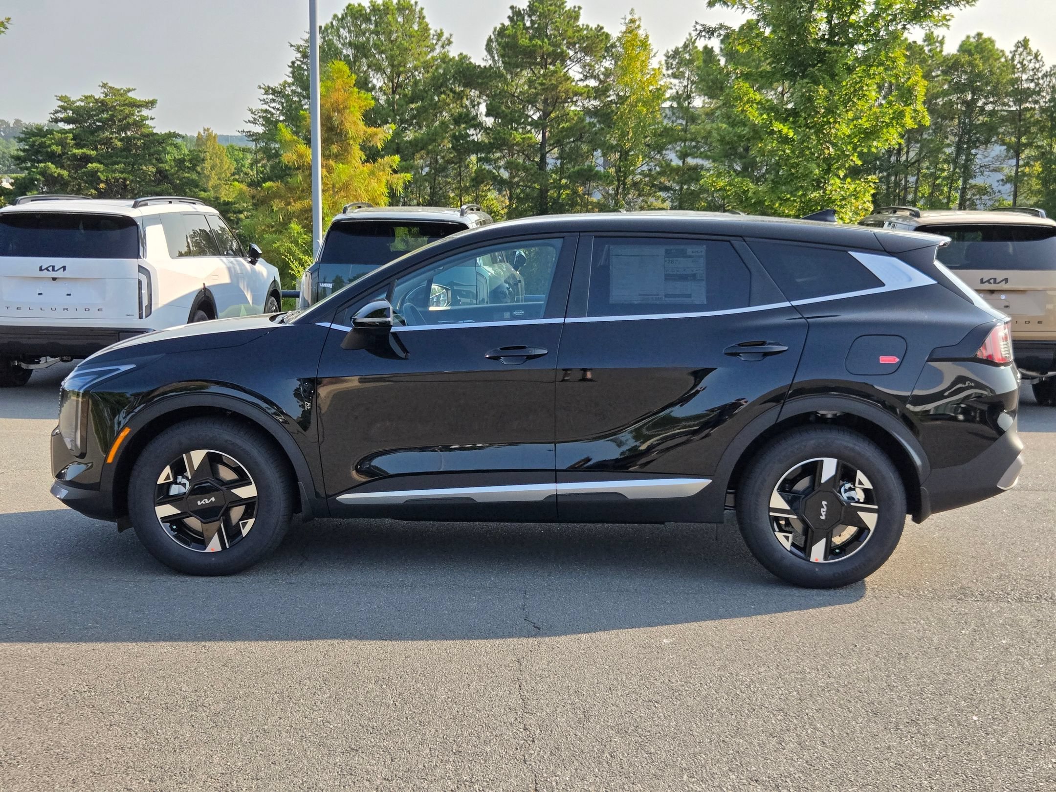 New 2026 Ebony Black Kia LX image 4