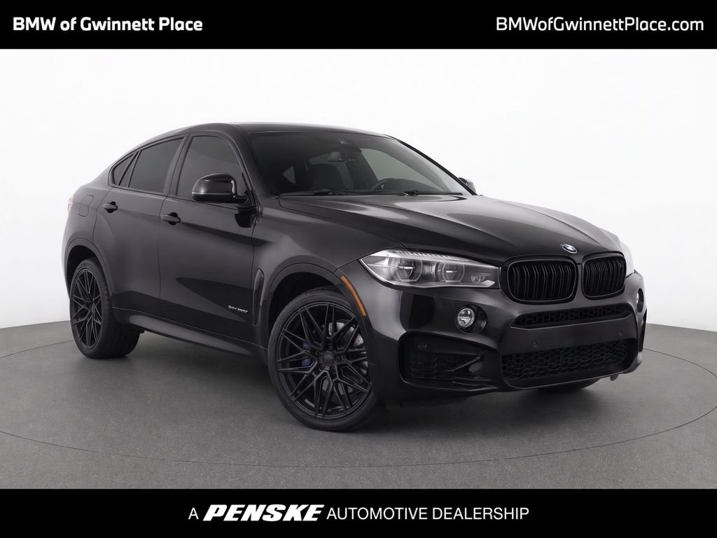 Used 2019 Black Sapphire Metallic BMW xDrive50i image 1