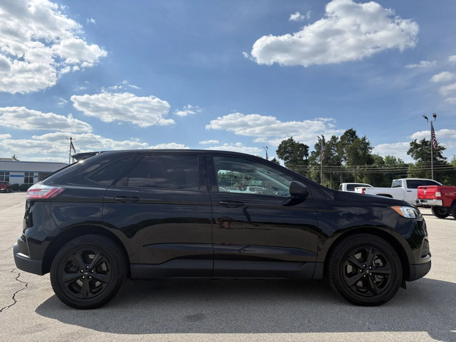 Used 2023 Agate Black Metallic Ford SE image 4