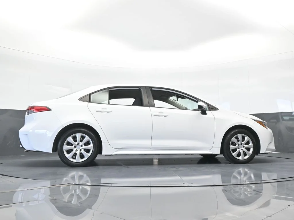 Used 2021 Super White Toyota LE image 50