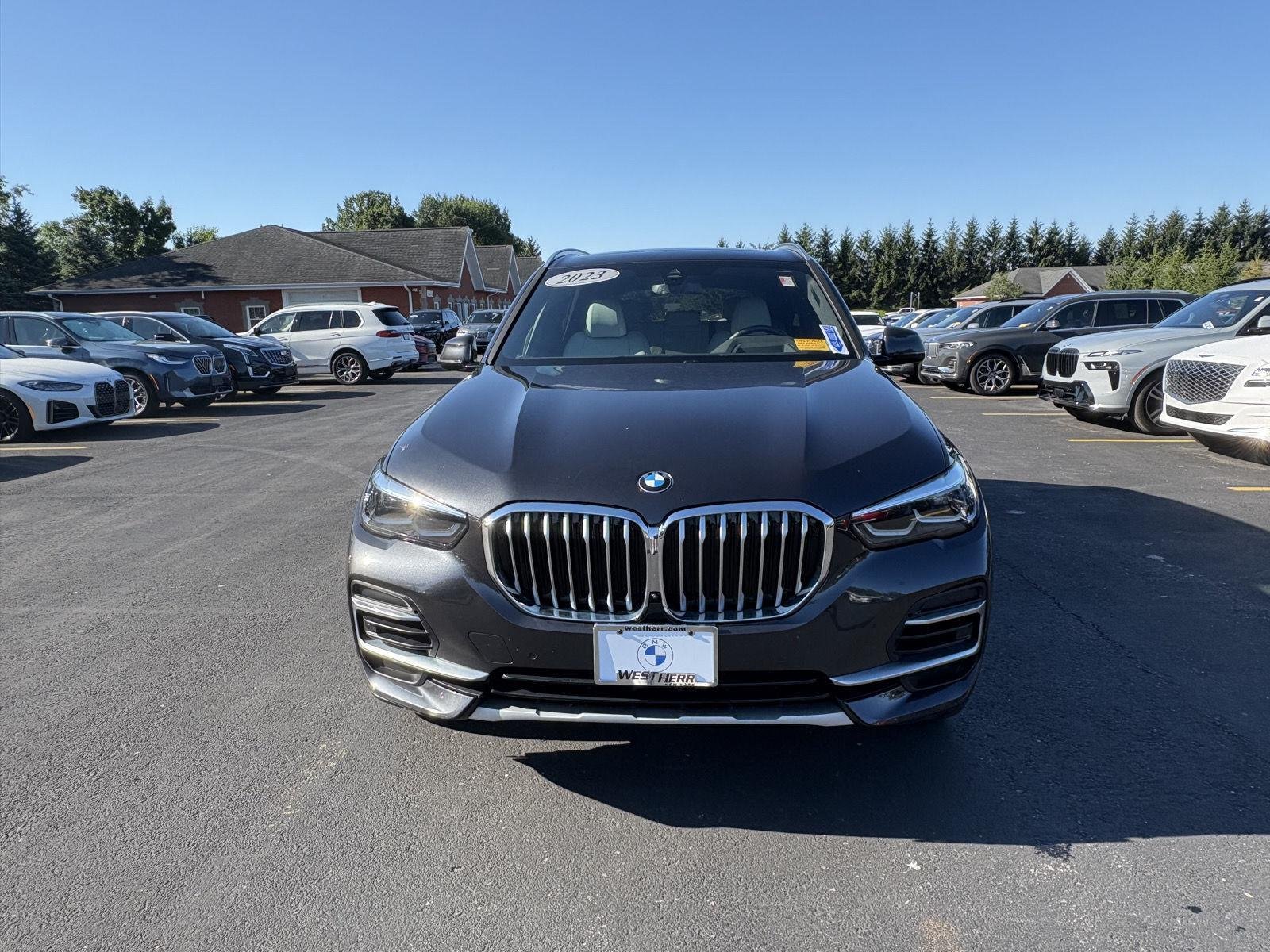Certified Used 2023 Dark Graphite Metallic BMW xDrive40i image 3