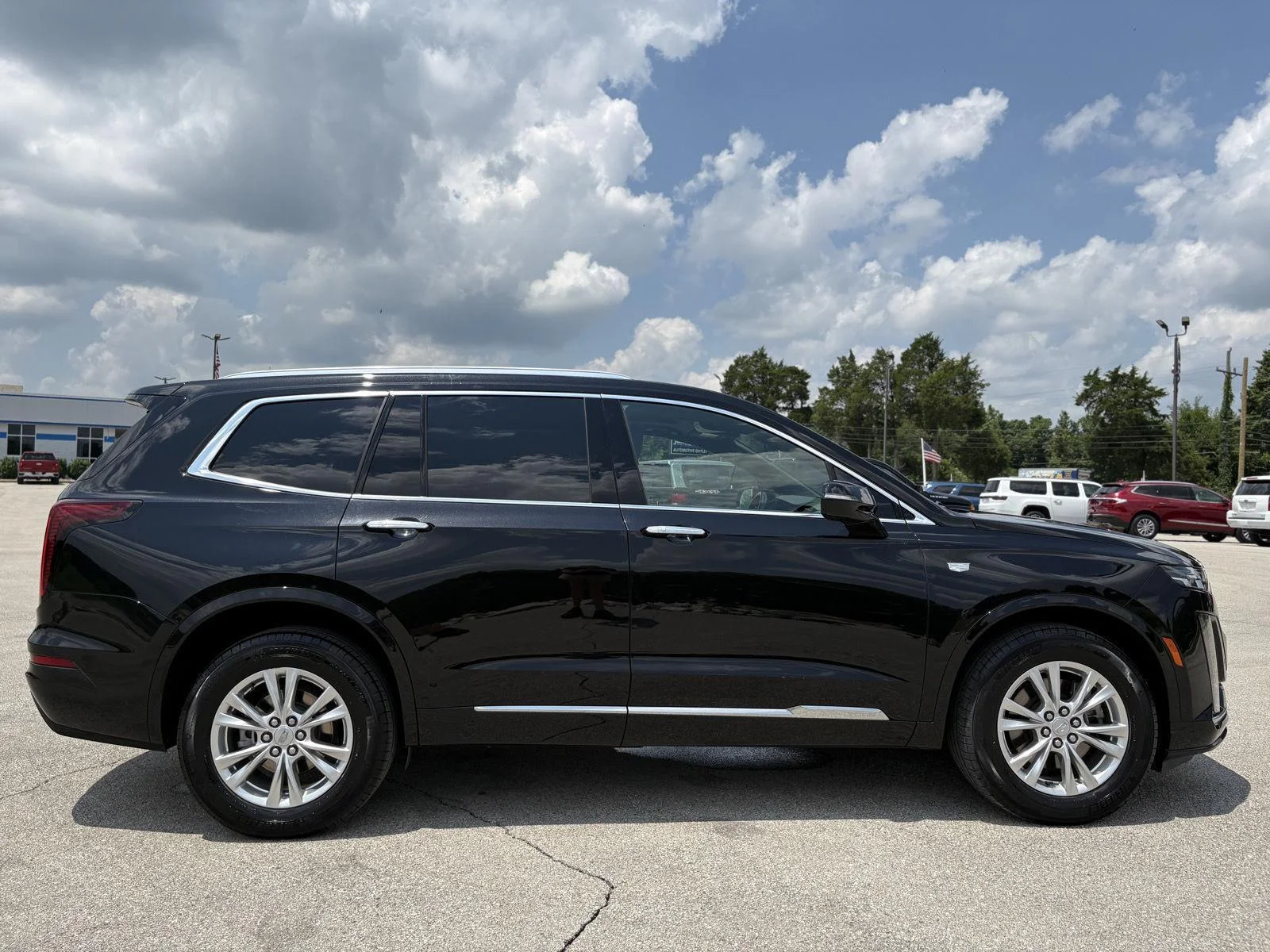 Used 2024 Stellar Black Metallic Cadillac AWD Luxury image 25