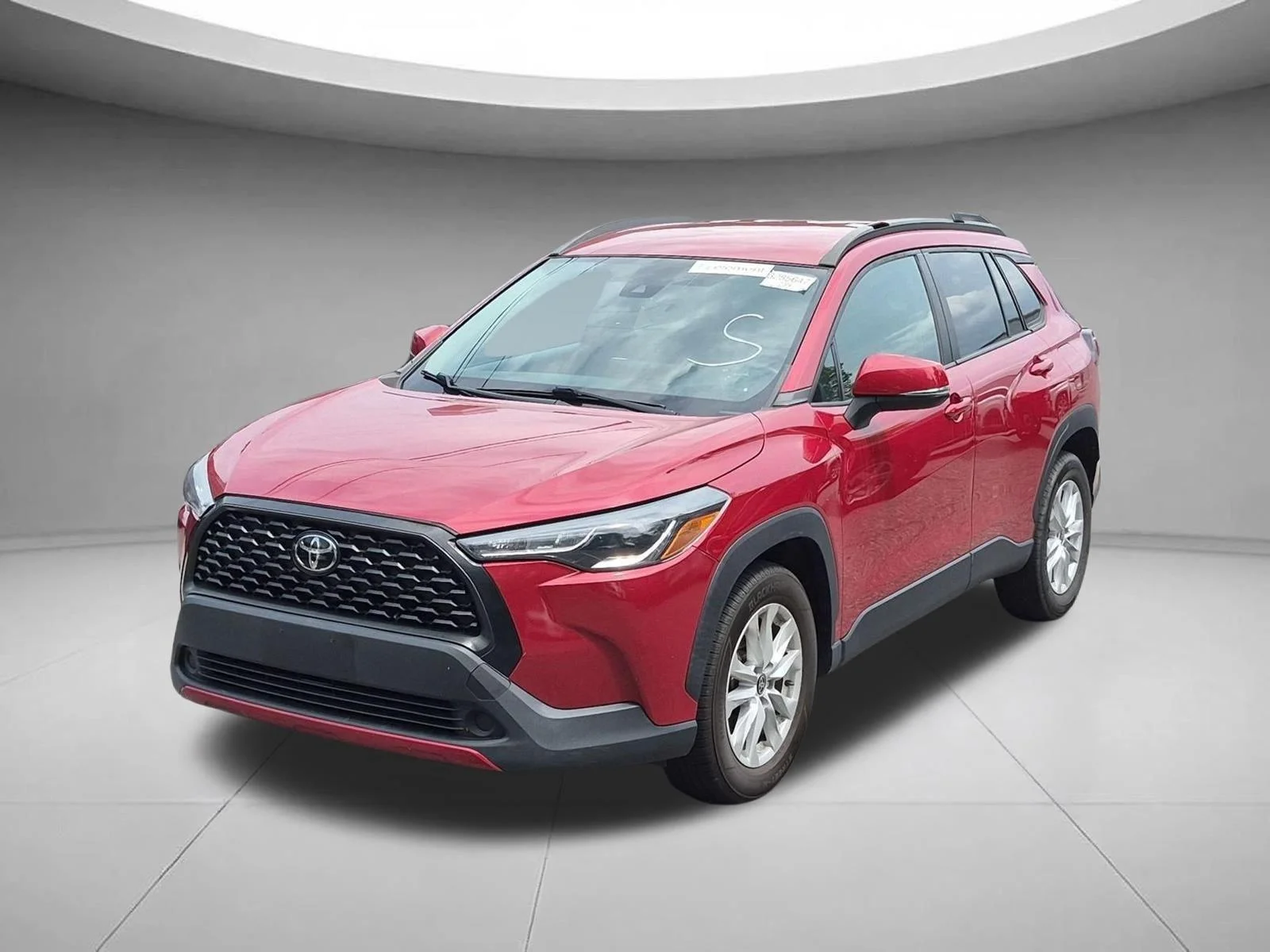 Used 2022 Barcelona Red Metallic Toyota LE image 1