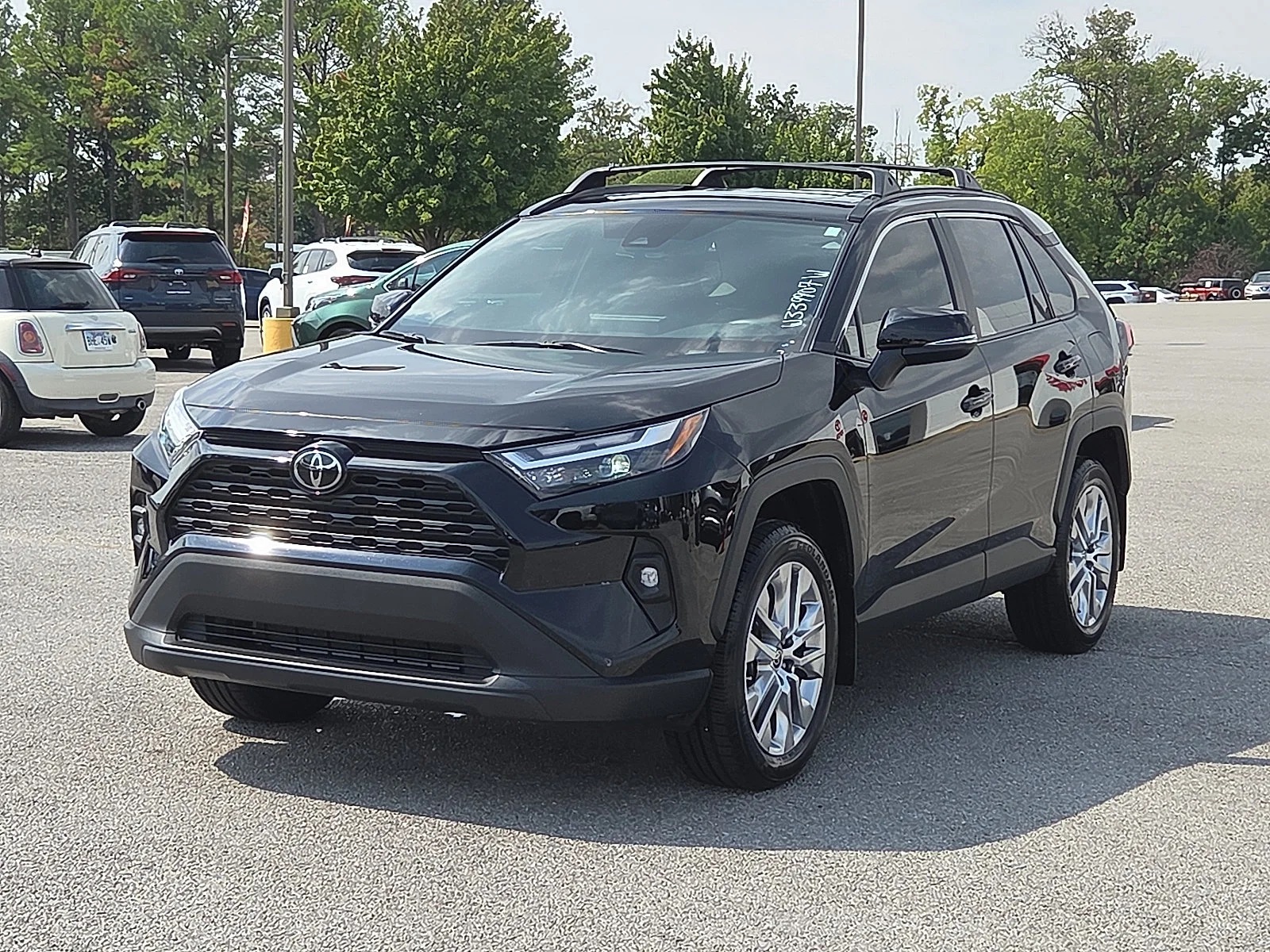 Used 2024 Midnight Black Metallic Toyota XLE Premium image 2