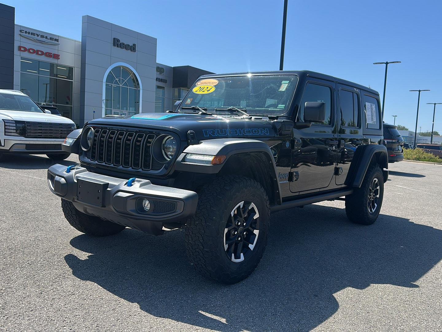 Used 2024 Black Clearcoat Jeep Rubicon image 1