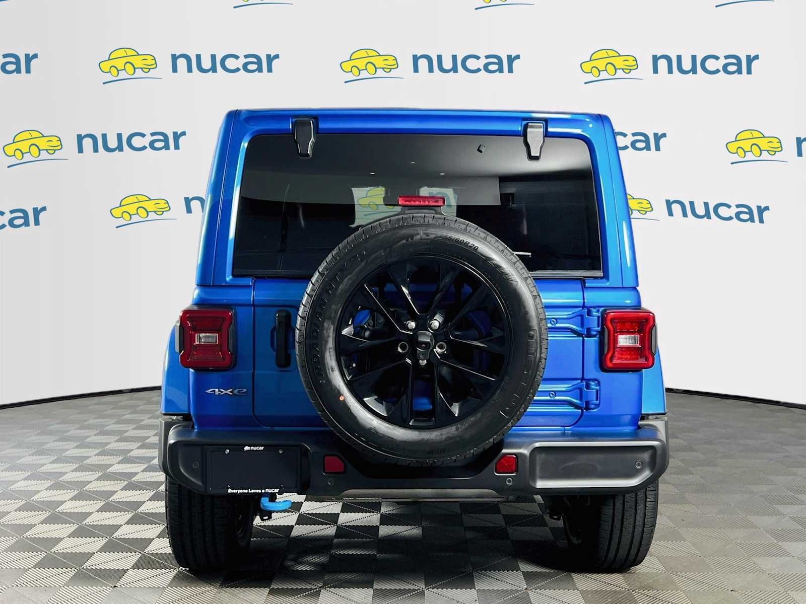 Used 2024 Hydro Blue Pearlcoat Jeep Sahara image 6
