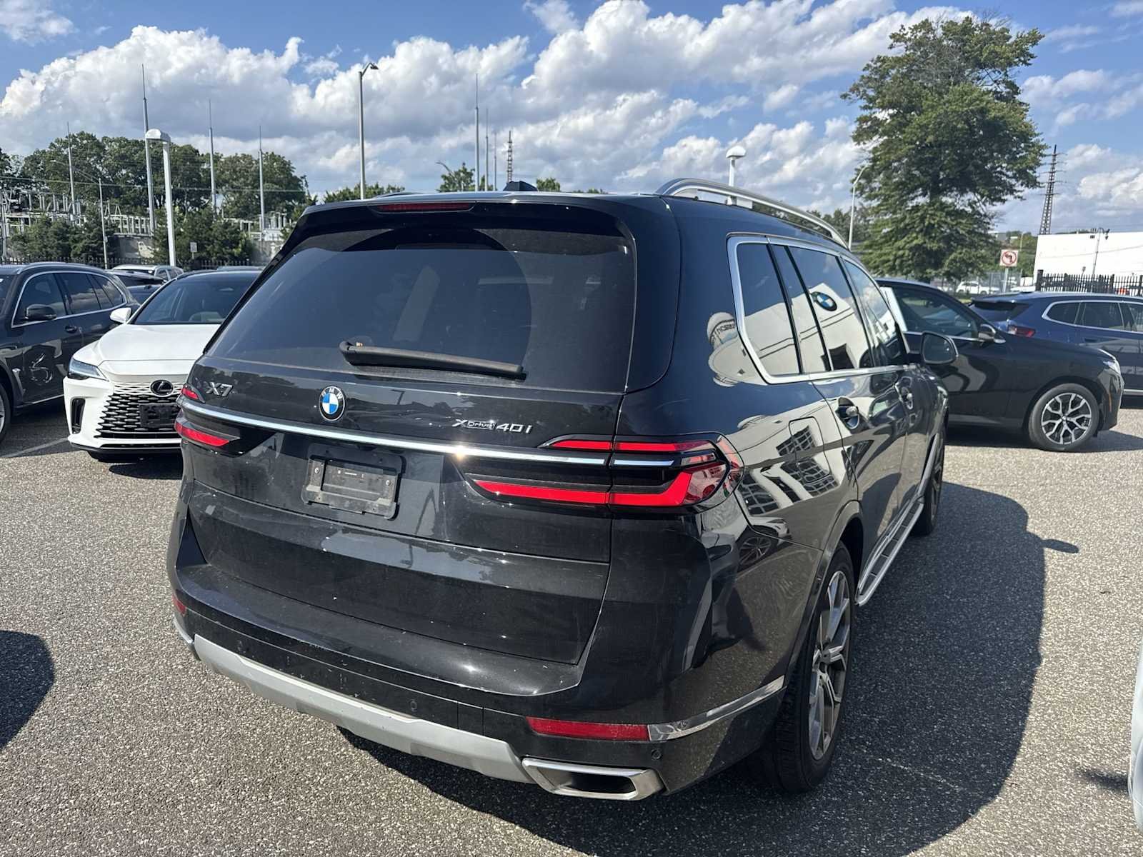 Certified Used 2024 Black Sapphire Metallic BMW xDrive40i image 7