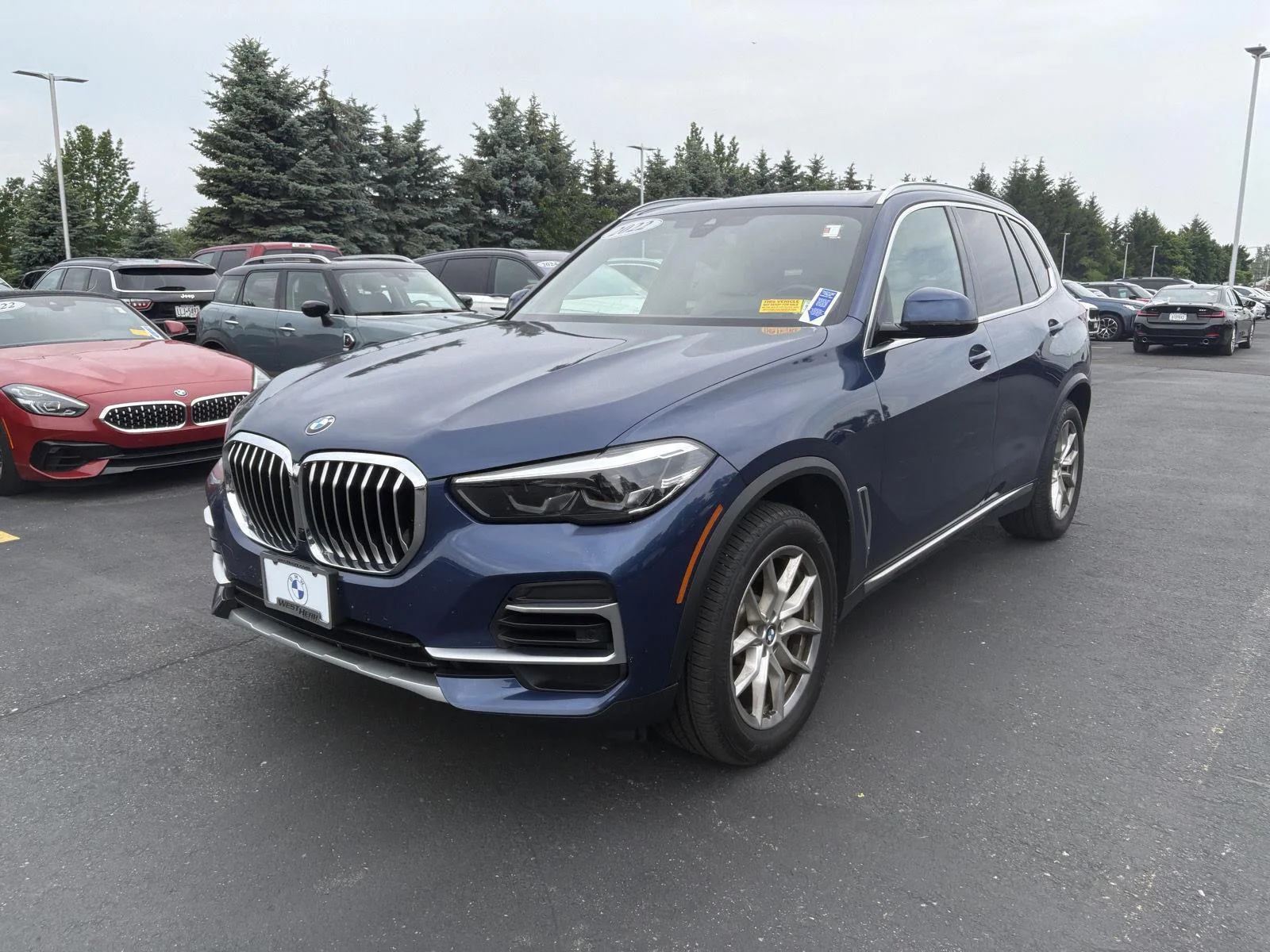 Used 2022 Phytonic Blue Metallic BMW xDrive40i image 4
