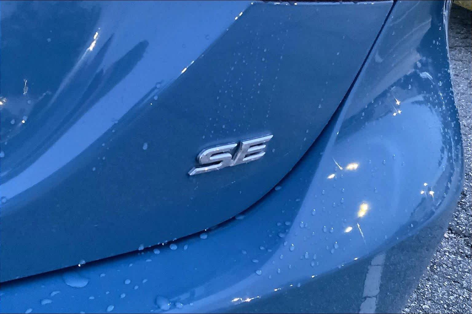 Used 2024 Cavalry Blue Toyota SE image 10