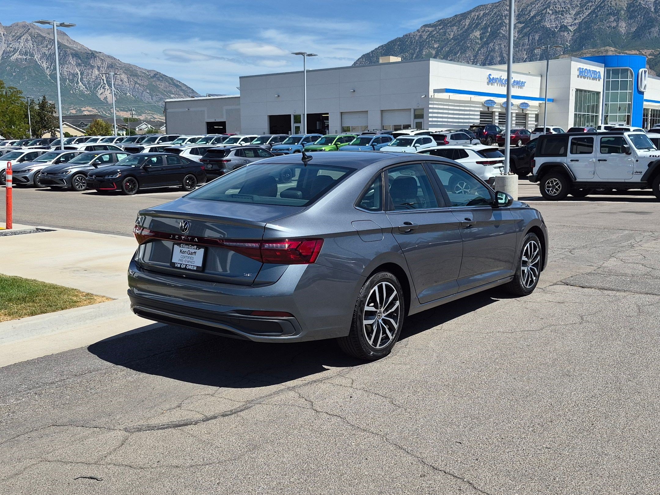 Certified Used 2025 Platinum Gray Metallic Volkswagen SE image 3
