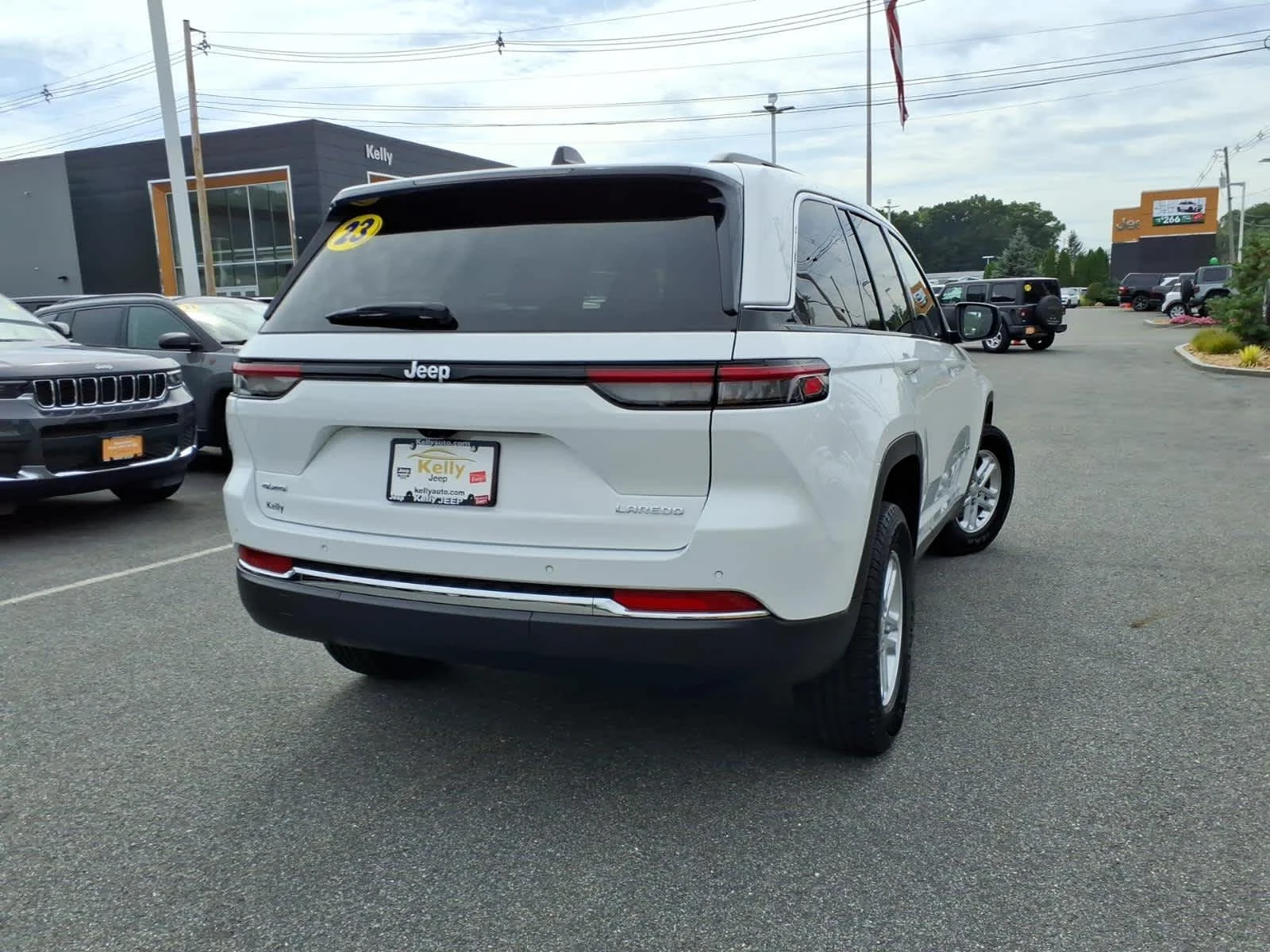Used 2023 Bright White Clearcoat Jeep Laredo image 8
