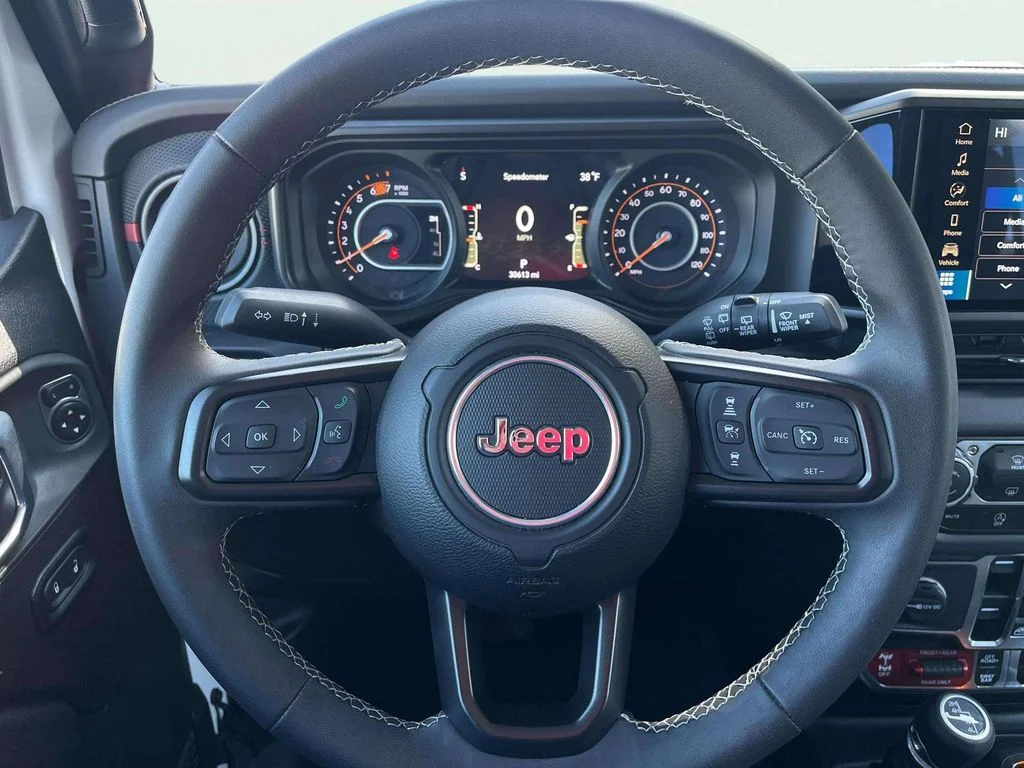 Used 2025 Bright White Clearcoat Jeep Rubicon image 16