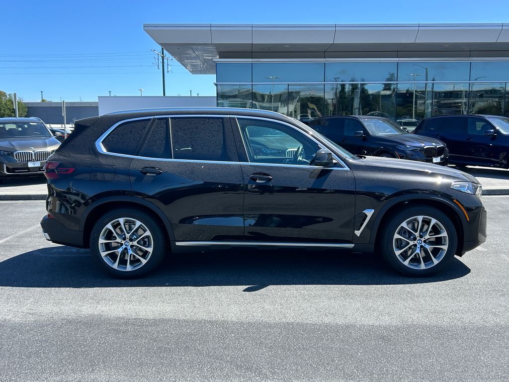 New 2026 Black Sapphire Metallic BMW xDrive50e image 6