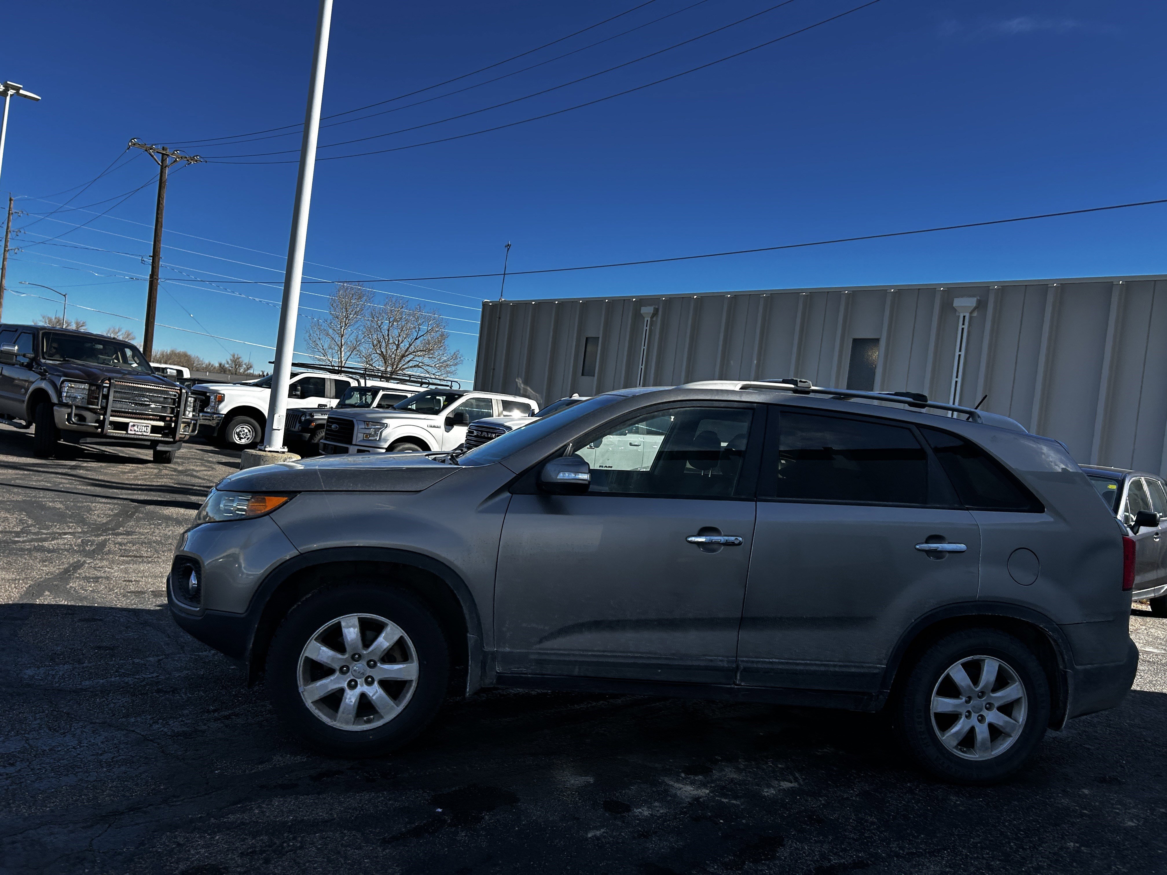 Used 2012 Kia Sorento LX with VIN 5XYKT3A67CG227172 for sale in Cheyenne, WY