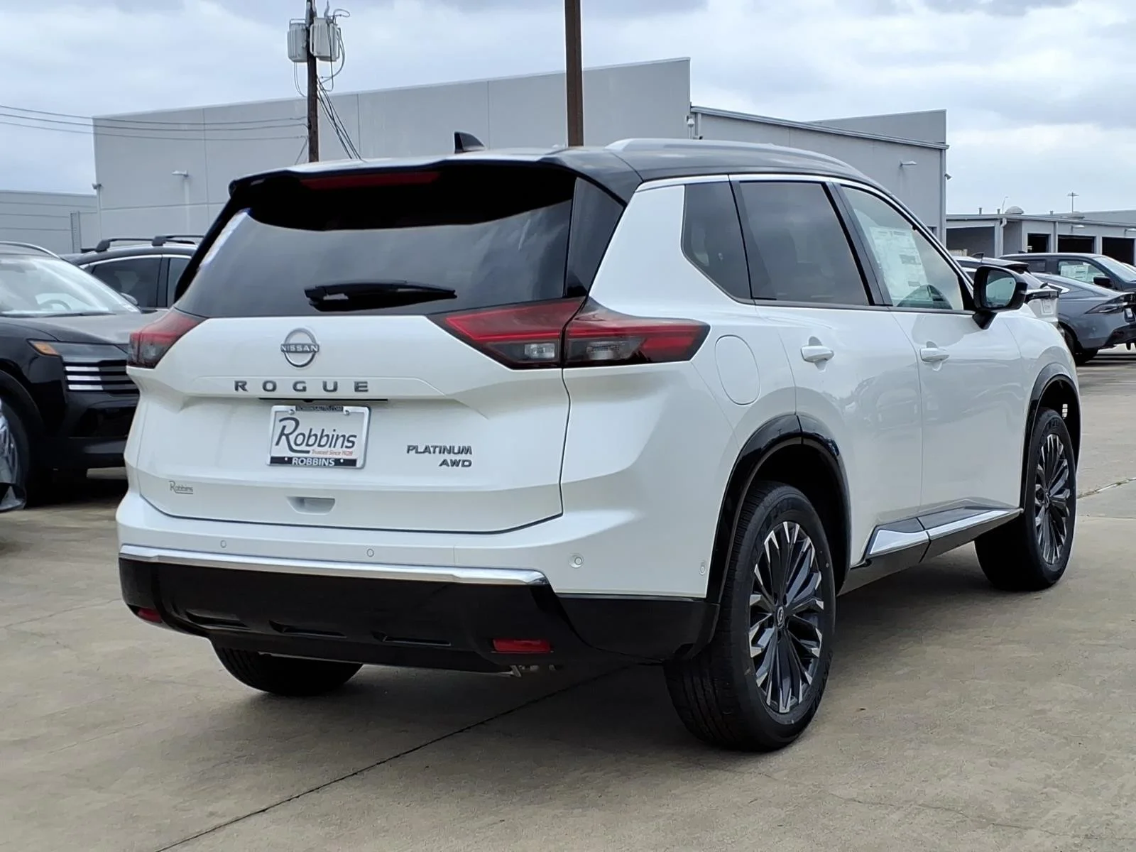 2026 Nissan Rogue Platinum White at Robbins Nissan