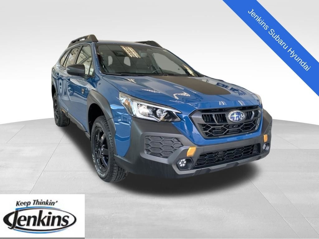 Used 2024 Blue Subaru Wilderness image 1