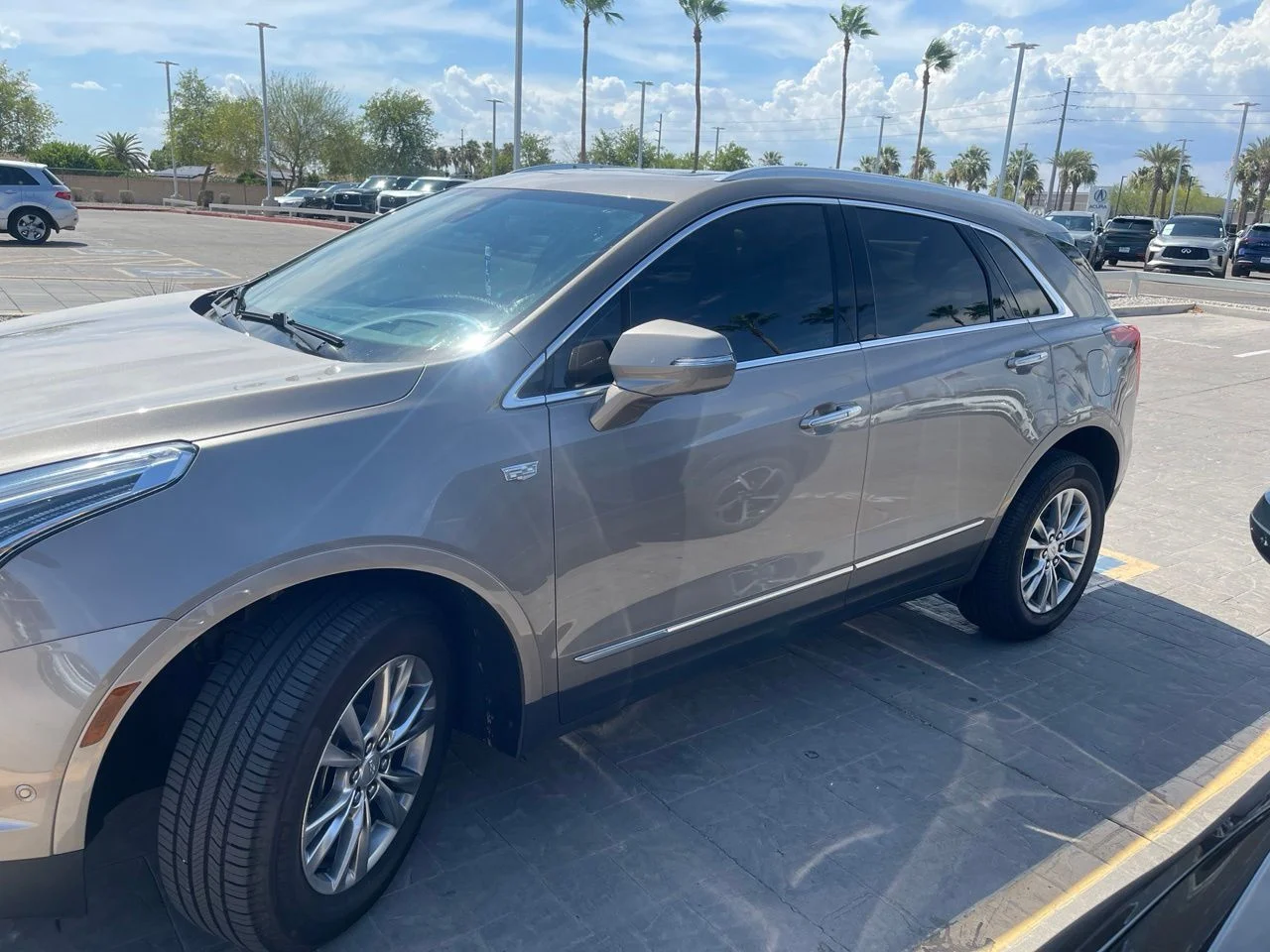 Used 2023 Latte Metallic Cadillac Premium Luxury image 1
