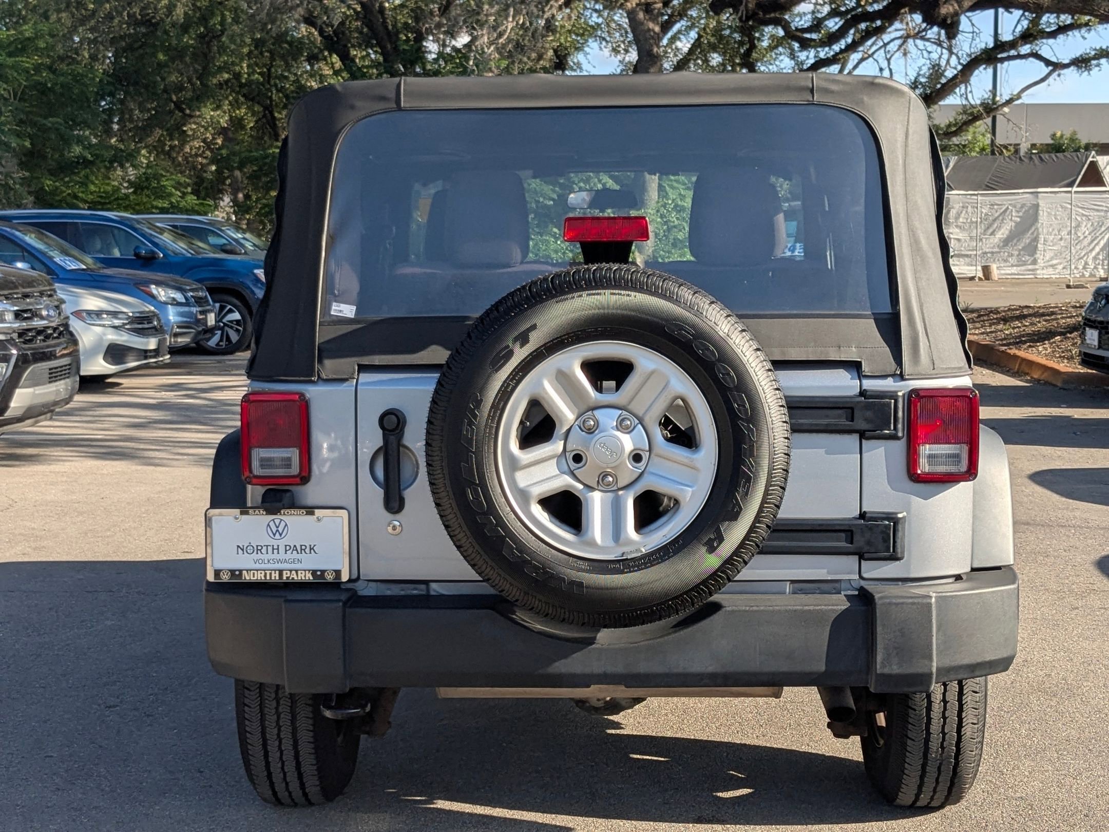 Used 2015 Billet Silver Metallic Clearcoat Jeep Sport image 4