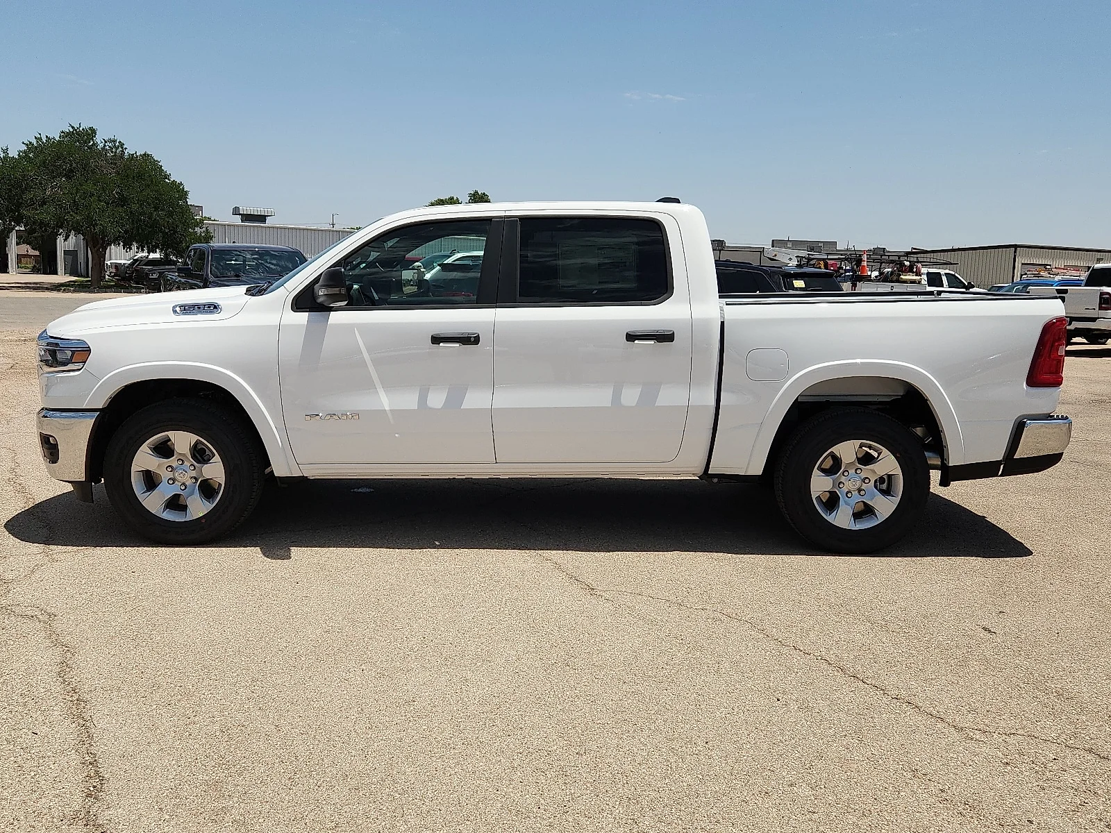 New 2026 Bright White Clear-Coat  Paint Ram LONE STAR CREW CAB 4X2 5