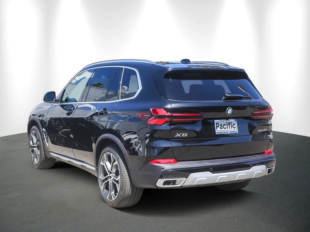 New 2026 Black Sapphire Metallic BMW xDrive40i image 4