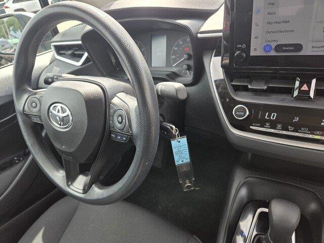 Used 2023 Classic Silver Metallic Toyota LE image 30