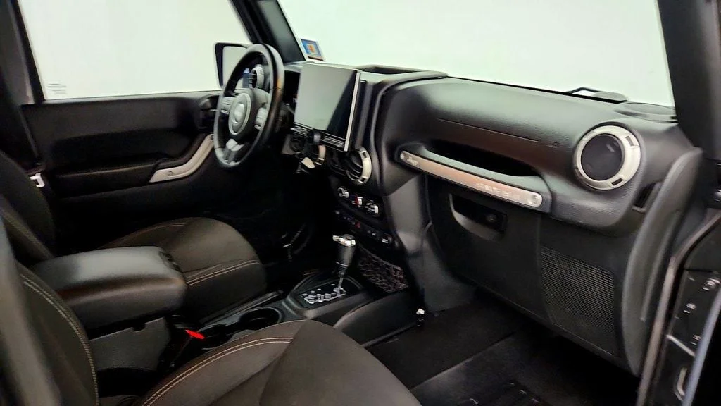 Used 2017 Granite Crystal Metallic Clearcoat Jeep Sahara 4x4 w/ Heated Seats, Remote Start & Connectivity Pkg image 24
