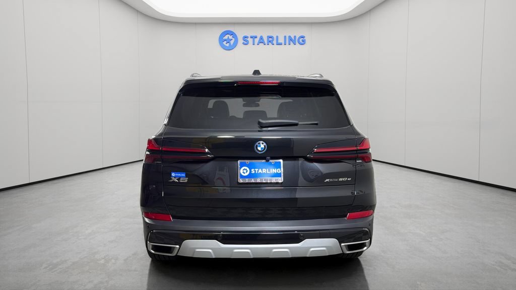 Used 2025 Black BMW xDrive50e image 7