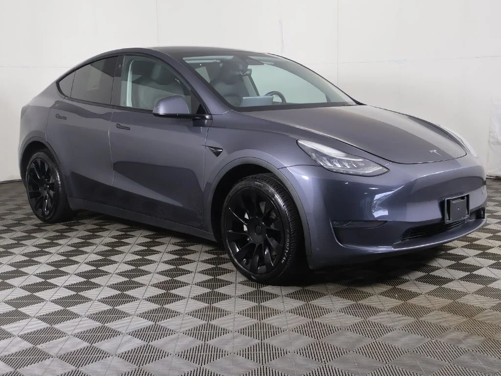 Used 2023 Tesla Model Y Long Range with VIN 7SAYGDEE6PA110038 for sale in Bedford, OH