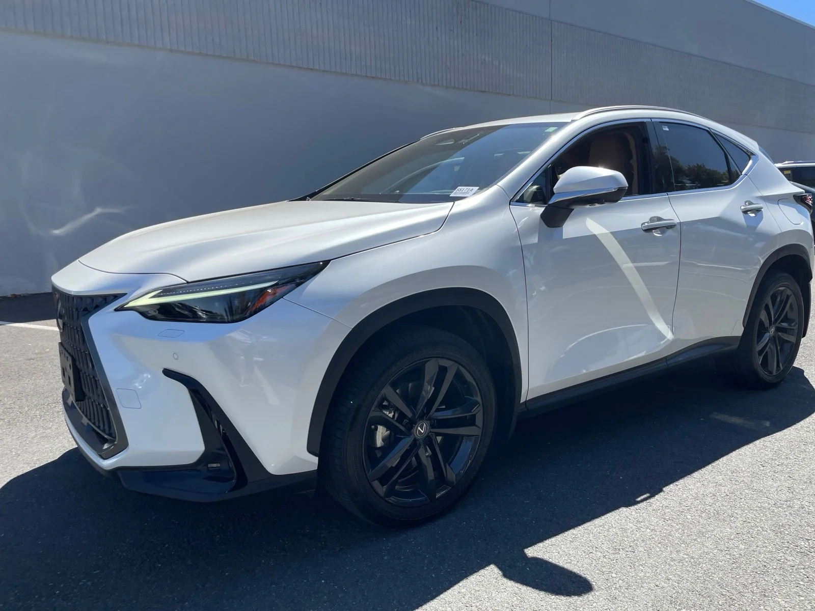 Used 2024 White Pearl Lexus 450h+ Luxury image 1