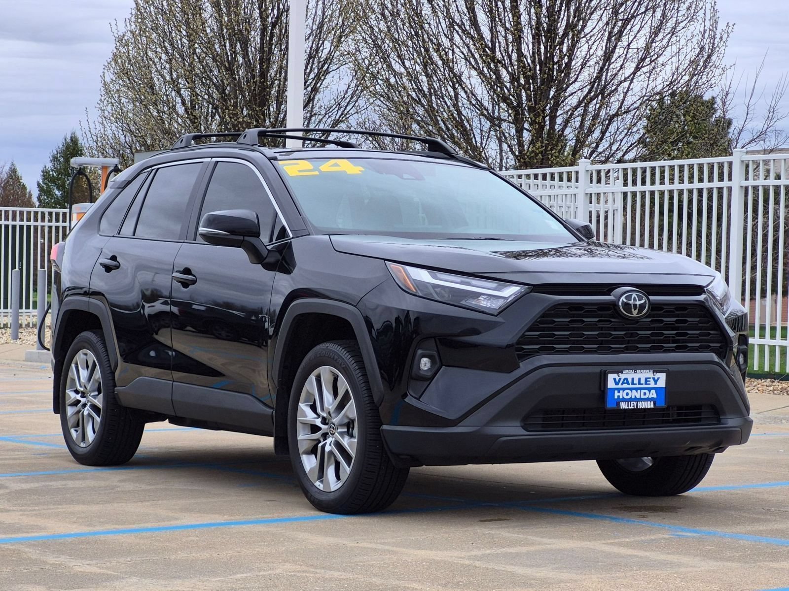 Used 2024 Midnight Black Metallic Toyota XLE Premium AWD image 4