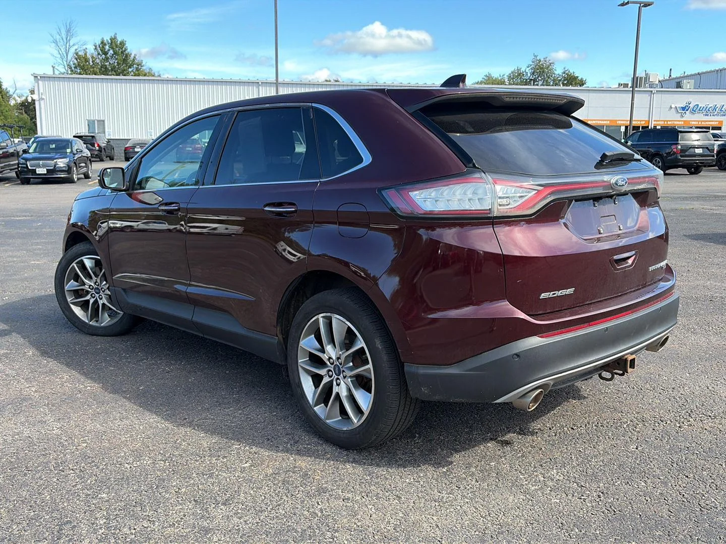 Used 2018 Burgundy Velvet Metallic Tinted Clearcoat Ford Titanium image 3