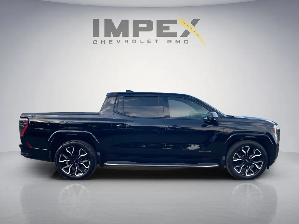 Used 2025 Onyx Black GMC Max Range Denali image 7