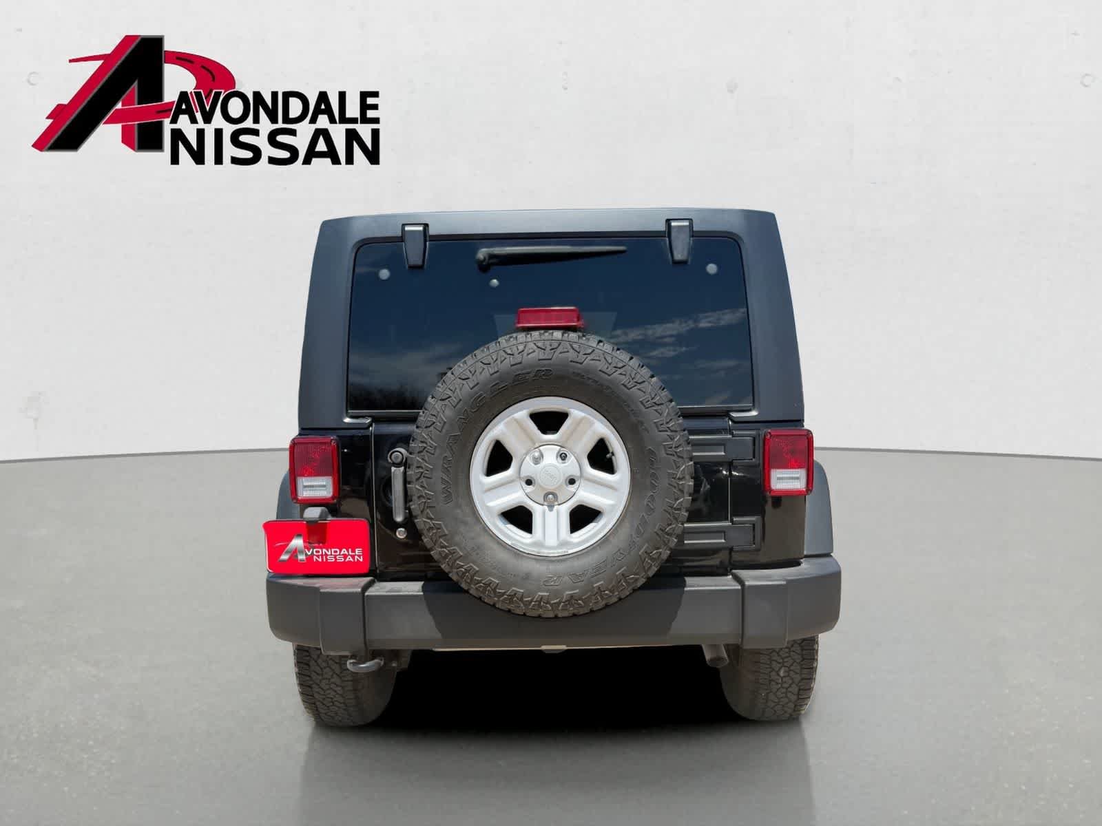 Used 2016 Black Clearcoat Jeep Sport image 5