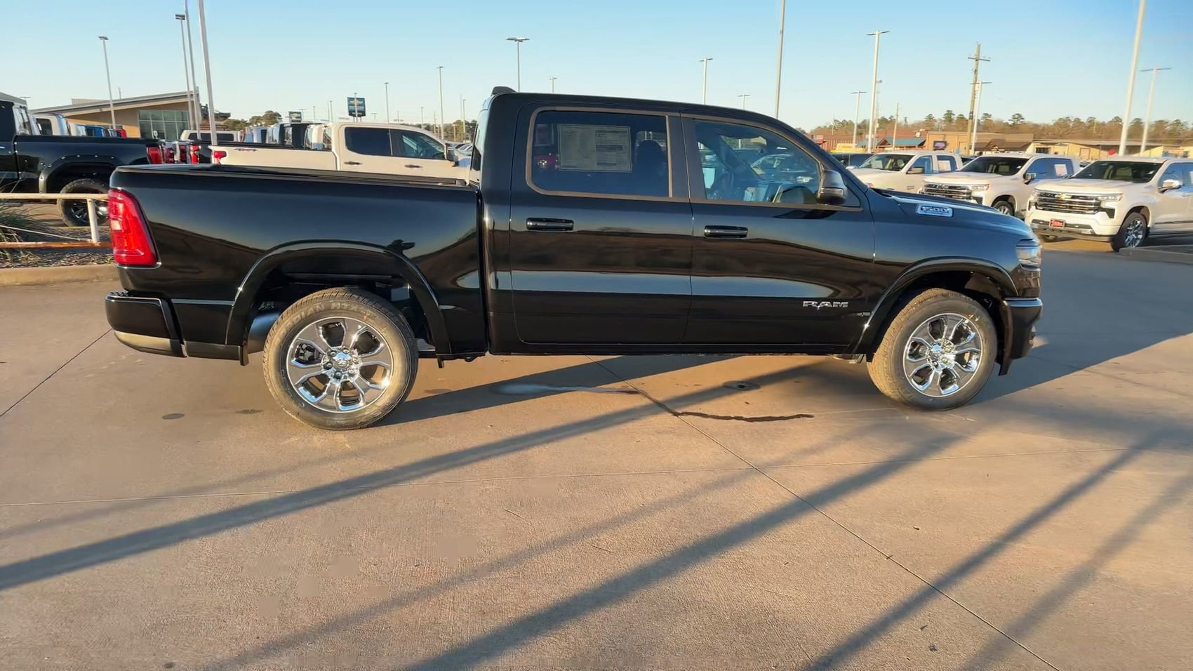 New 2025 Diamond Black Crystal Pearlcoat Ram Lone Star image 2