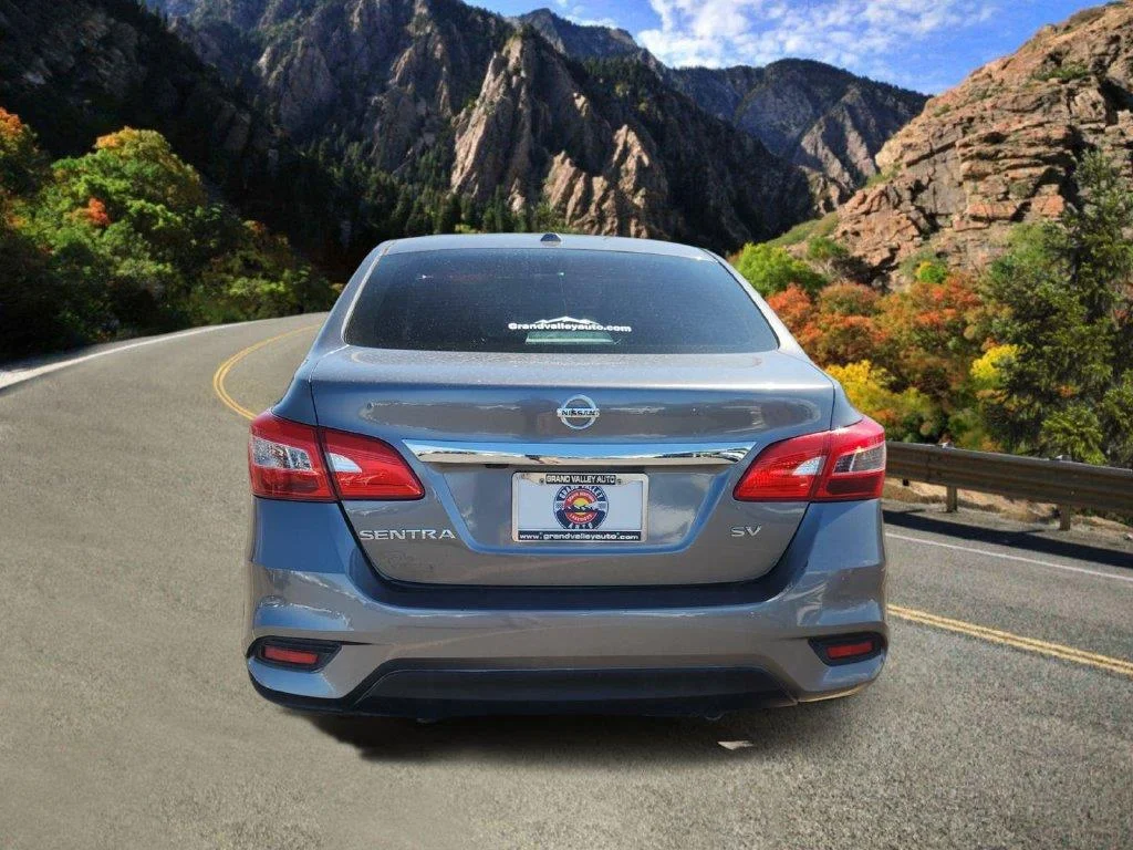 Used 2017 Gun Metallic Nissan SV image 4